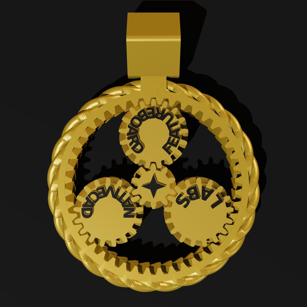 Top view of the pendant showing the sun, three planets and the ring